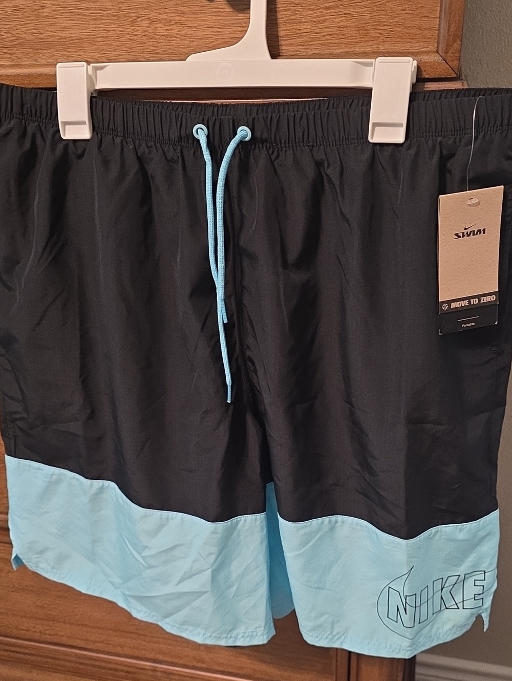 Nike Men’s Black and Light Blue Colorblock Swim Trunks